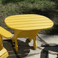 Adirondack chair and wood side table outdoors